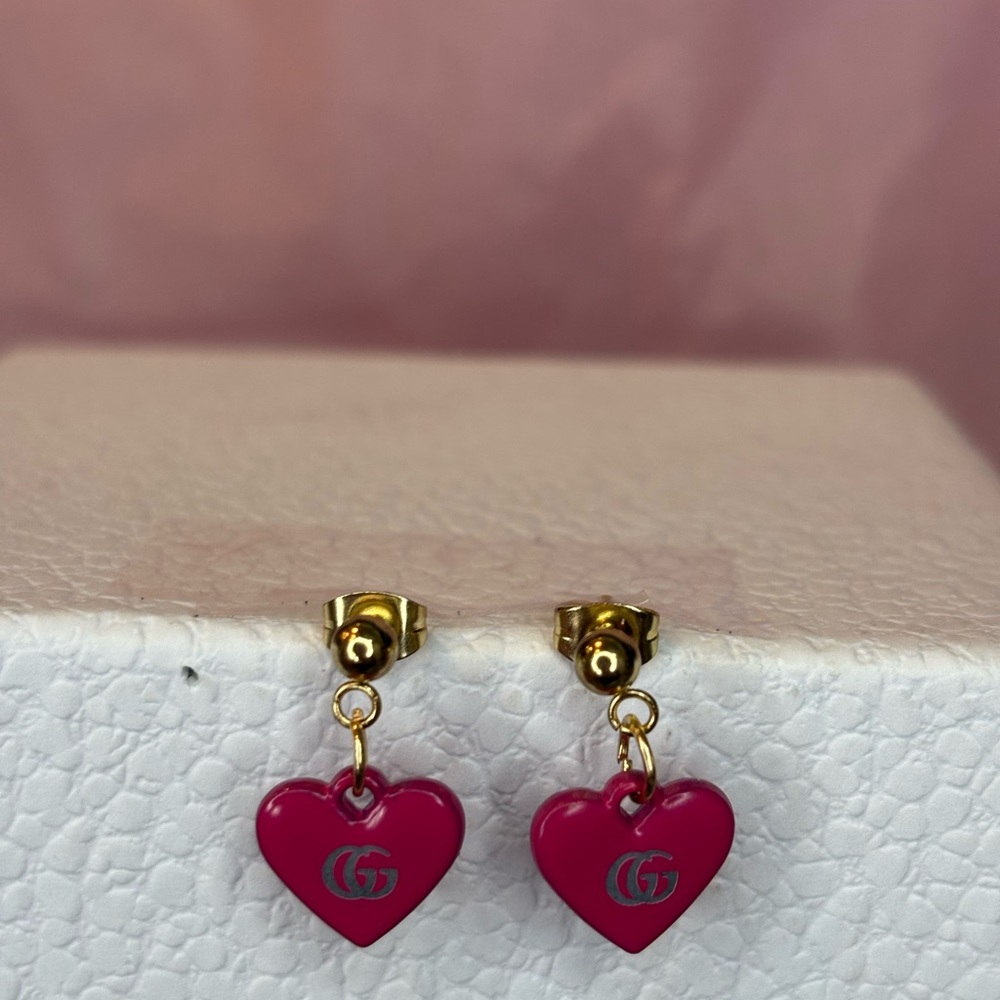 Hot pink Gucci earrings